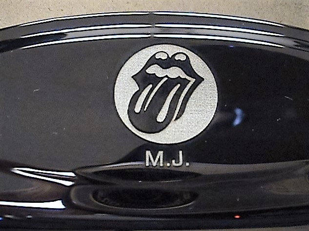 Ace Laser Tek laser mark of M.J. for the Rolling Stones on a Harmonica